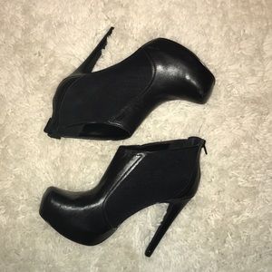 Black Jessica Simpson booties.